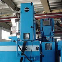 Grinding machines for the two opposite sides of strips